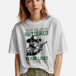 You&#39;ve Just Buttered Your Last Biscuit Shirt, Funny Cowboy Shirt, Cowboy Cat, Meme Tshirt, Gift For Cat Lovers, Graphic Tee