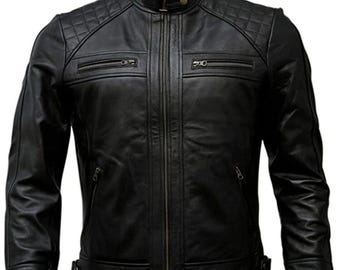 May include: Black leather jacket with a quilted shoulder design, a stand-up collar, and multiple zippered pockets. The jacket has a front zipper closure and adjustable waist straps. A classic outerwear piece.