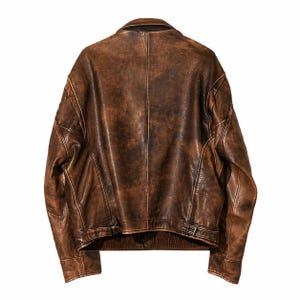 May include: A brown leather jacket with a distressed finish. The jacket features a classic collar, shoulder detailing, and a belt at the waist. The back view showcases the jacket's stitching and texture, with a vintage aesthetic.