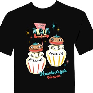 May include: Black t-shirt with a retro diner sign, ketchup and mustard bottles with cartoon faces, and the text "Hamburger Heaven".