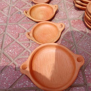Natural clay pan - from small to large sizes - for traditional cooking on charcoal or gas