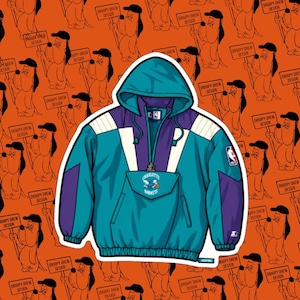 May include: A teal, purple, and white Charlotte Hornets Starter jacket with a hood and a front pocket. The jacket features the Hornets logo and NBA emblem. The background is orange with a repeating cartoon dog design.