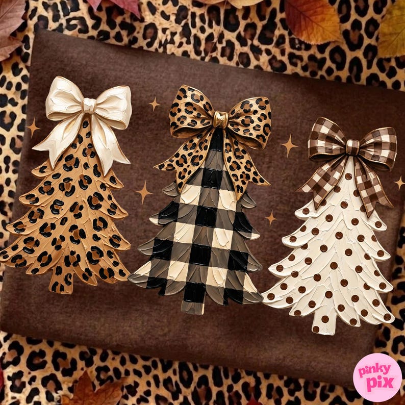 May include: Three decorative tree-shaped ornaments featuring distinct patterns. The first has a leopard print with a cream bow, the second a black and white buffalo check with a leopard bow, and the third white with brown polka dots and a brown plaid bow.