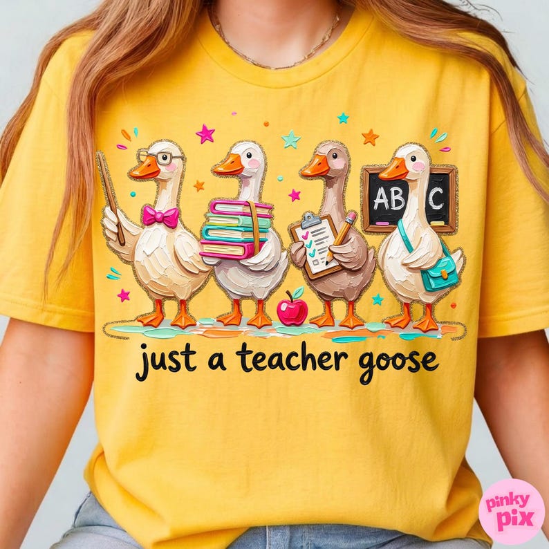 May include: Yellow t-shirt with a whimsical design featuring four cartoon geese dressed as teachers. One goose holds a pointer, another books, a third a clipboard, and the last a chalkboard. The text "just a teacher goose" is below the geese.