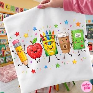 May include: A white tote bag featuring a colorful cartoon illustration of a pencil, a red apple, a box of crayons, a coffee cup, and a green notebook, all with smiling faces. The design is surrounded by small multi-colored stars and hearts.