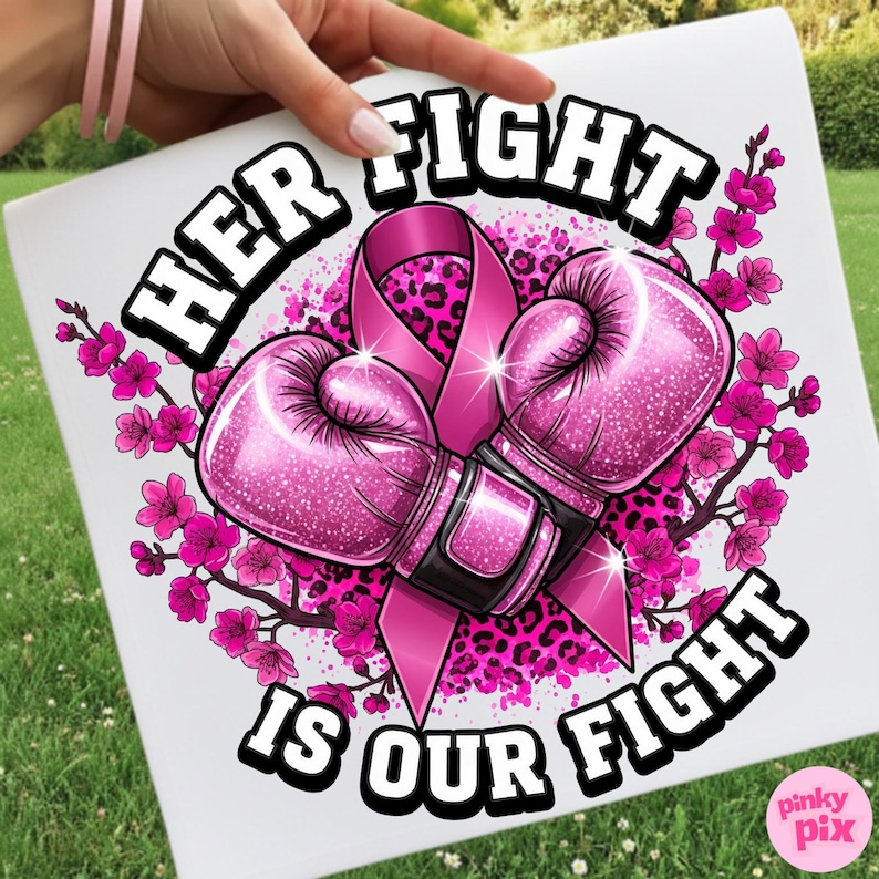 May include: A square canvas print featuring pink boxing gloves and a pink ribbon, symbolizing breast cancer awareness. The words "HER FIGHT IS OUR FIGHT" are displayed in bold, black letters. Pink flowers and a leopard print background complete the design.