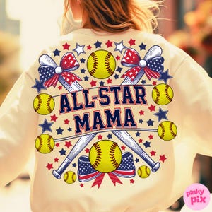 May include: Cream-colored sweatshirt featuring a softball-themed design. The graphic includes yellow softballs, baseball bats, and the text "ALL-STAR MAMA" in navy blue and red. Accents include red, white, and blue stars and bows.