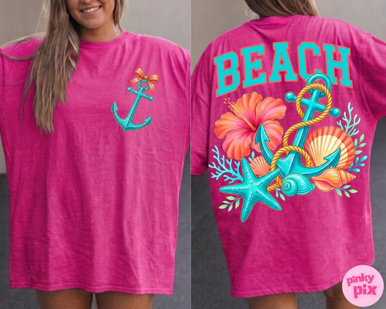 May include: A magenta t-shirt featuring a turquoise anchor design on the front and the word "BEACH" on the back. The back design includes a turquoise anchor, starfish, and seashell graphics with a hibiscus flower.