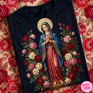 May include: A navy blue t-shirt featuring a religious image of a woman with a halo, wearing a blue and red robe, surrounded by roses in various colors. The image has a vintage, artistic style.