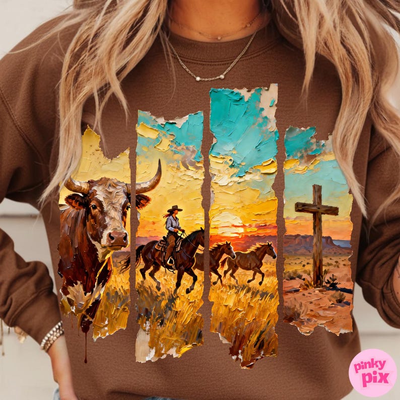 May include: Brown sweatshirt featuring a Western-themed graphic. The design includes a bull, a cowgirl on horseback, running horses, and a cross against a sunset backdrop. The artwork is in a painterly style.