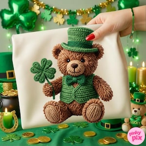 May include: A brown teddy bear wearing a green vest, bow tie, and top hat, holding a green four-leaf clover. The bear is on a white background, with St. Patrick's Day decorations in the background, including shamrocks and gold coins.