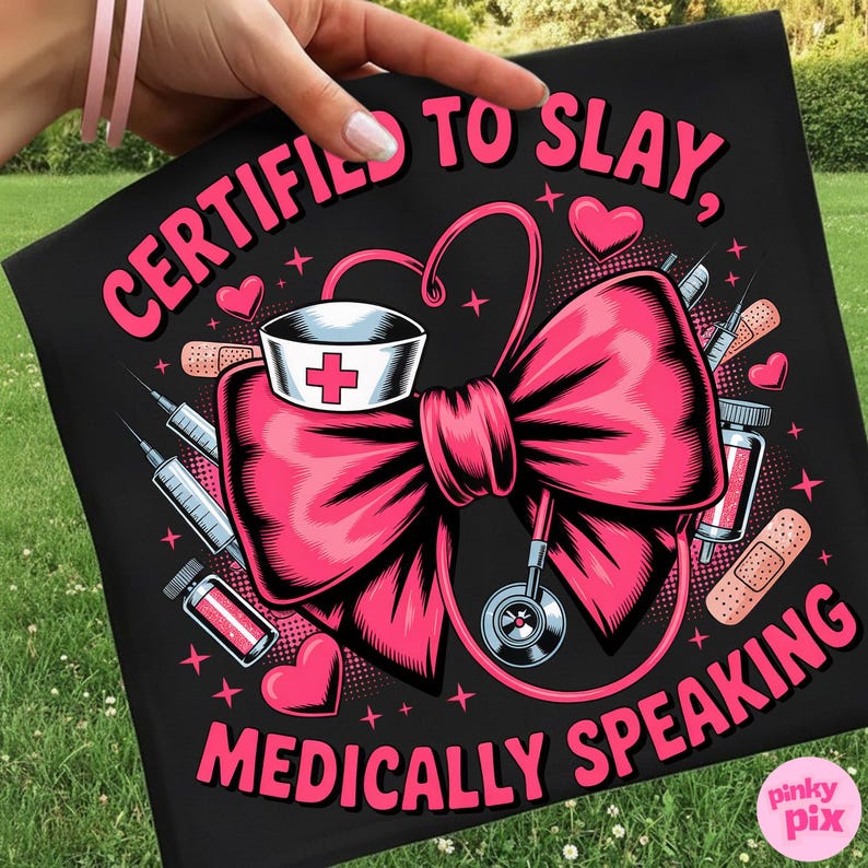 May include: Black t-shirt with a pink bow, nurse's hat, stethoscope, syringes, and the text "CERTIFIED TO SLAY, MEDICALLY SPEAKING." The design includes hearts and medical elements.