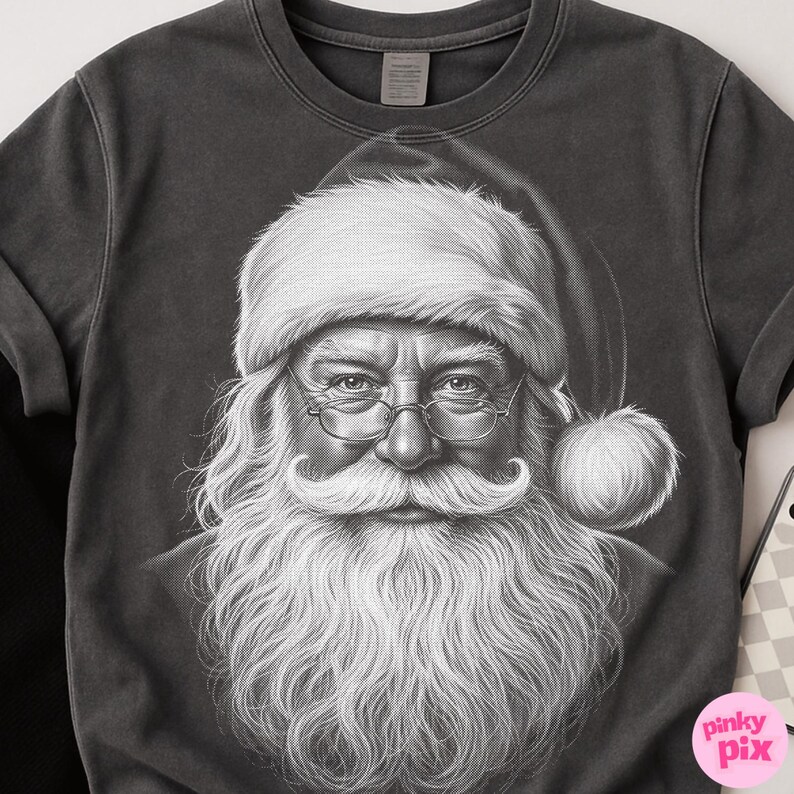 May include: Dark gray crew neck sweatshirt featuring a detailed black and white portrait of Santa Claus. Santa is wearing a traditional hat, glasses, and has a long white beard. The image is a close-up of Santa's face.