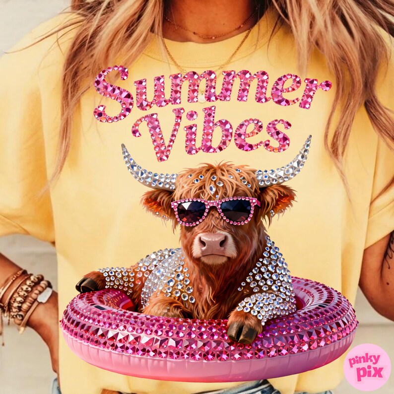 May include: Yellow t-shirt with the text "Summer Vibes" in pink glitter. A brown cow wearing sunglasses and a bejeweled jacket is floating in a pink inflatable ring. The cow has crystal-studded horns.