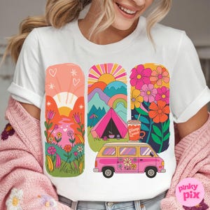 May include: White t-shirt with a graphic design of a pink camper van, a tent, mountains, a sunset, and flowers. The text "Glamp Queen" is on a pink cup.