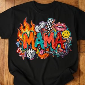 May include: Black t-shirt with a colorful graphic design. The design features the word "MAMA" in vibrant orange, teal, and red, surrounded by flames, dice, a lightning bolt, lips, a smiley face, and barbed wire.