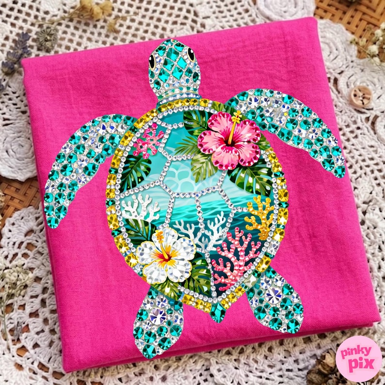 May include: A hot pink fabric with a bejeweled sea turtle design. The turtle features turquoise gems, a yellow and gold border, and a tropical scene with hibiscus flowers, coral, and ocean waves.