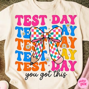 May include: A set of three ceramic mugs with a speckled, matte finish. Each mug features a different color: light blue, cream, and gray. The mugs have a simple, modern design and a comfortable handle.