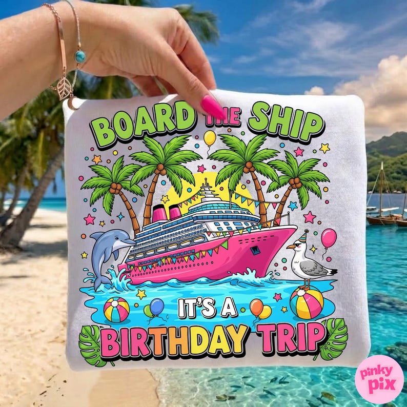 May include: White square cushion featuring a vibrant graphic of a pink cruise ship, palm trees, a dolphin, and a seagull. Text reads "BOARD THE SHIP" and "IT'S A BIRTHDAY TRIP". The design includes balloons and stars.