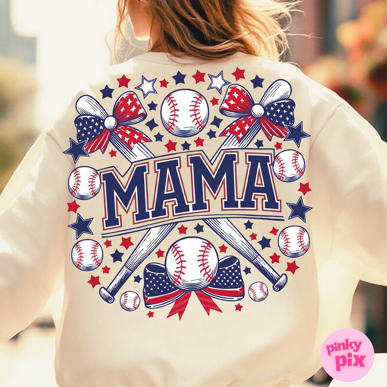 May include: A beige sweatshirt with a baseball-themed design. The design features two crossed baseball bats, a baseball, and the word "MAMA" in navy blue letters. The bats are decorated with red, white, and blue ribbons and stars.
