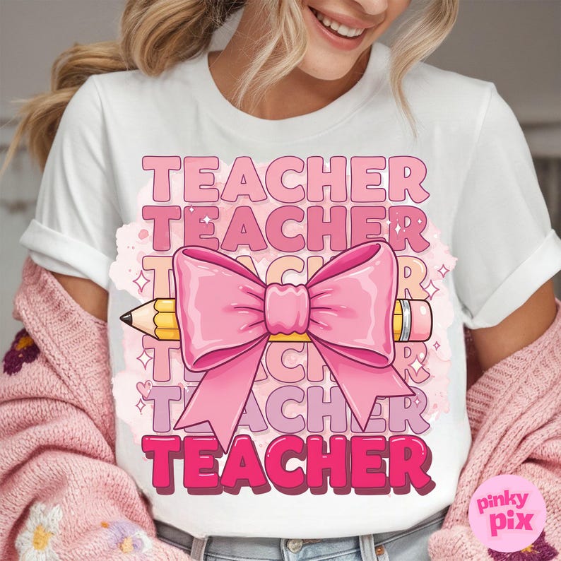 May include: White t-shirt with the word "TEACHER" repeated in pink and a pink bow with a yellow pencil going through it.