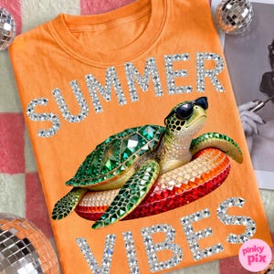 May include: Orange t-shirt with the words "SUMMER VIBES" in rhinestone lettering. A bejeweled turtle wearing sunglasses floats on a red, orange, and yellow inflatable ring. Two disco balls are on either side of the shirt.