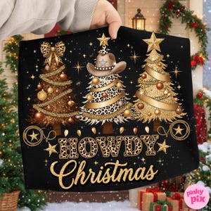 May include: Black Christmas-themed decorative flag featuring three stylized Christmas trees with gold and leopard print accents. The text "HOWDY Christmas" is displayed in gold glitter lettering. Gold stars and ornaments complete the design.