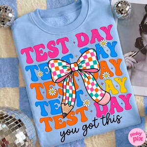 May include: A set of three ceramic nesting bowls in shades of blue, green, and white. The bowls feature a speckled glaze and a simple, modern design. The largest bowl is approximately 6 inches in diameter.