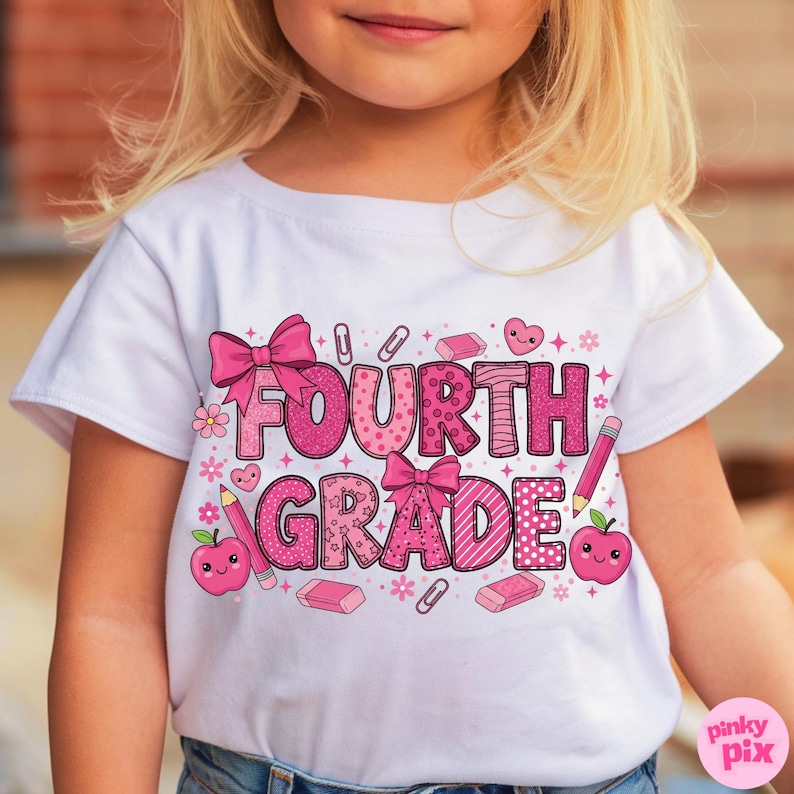 May include: White t-shirt with a pink graphic that says "FOURTH GRADE". The design includes pink bows, pencils, apples, hearts, and other school-themed elements. The shirt is worn by a child.