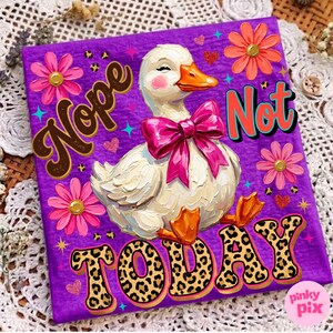 May include: A purple canvas print featuring a whimsical duck with a pink bow, surrounded by flowers and the words "Nope Not Today." The text "TODAY" has a leopard print pattern. The artwork has a playful, cartoonish style.