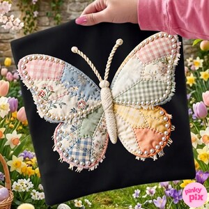 May include: A black fabric square featuring a large, central butterfly appliqu&eacute;. The butterfly is constructed from various pastel-coloured fabric patches, including gingham and floral patterns, outlined with white faux pearls and frayed edges.