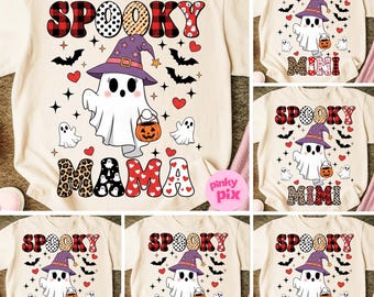 May include: Beige t-shirts with Halloween-themed designs. Each shirt features the word "Spooky" in various patterns, a ghost wearing a witch hat, and a pumpkin. The shirts are customized with the words "Mama", "Mini", "Mimi", "Auntie", "Gigi", and "Nana".