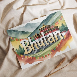 May include: Watercolor painting of Bhutan featuring a traditional building, mountains, and colorful prayer flags. The word "Bhutan" is prominently displayed in a stylized font. The artwork is set against a neutral background.