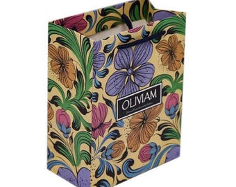 Bolsa de regalo de papel floral con asas, embalaje ecológico personalizable, ideal para comercios, regalos y ocasiones especiales.