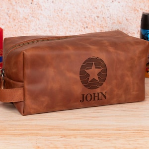 Personalized leather superhero toiletry bag featuring Batman for Halloween and Captain America for Christmas, perfect gift for husband or boyfriend.