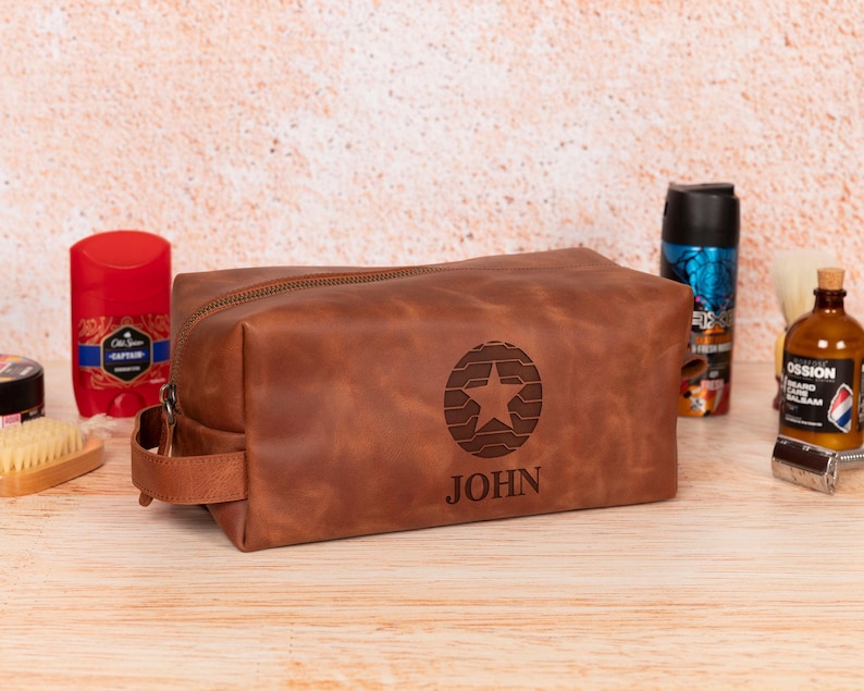 Personalized leather superhero toiletry bag featuring Batman for Halloween and Captain America for Christmas, perfect gift for husband or boyfriend.