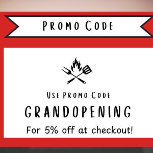 May include: Red and white promotional banner with the text "PROMO CODE" and a black and white illustration of a crossed spatula and fork with flames. The text "USE PROMO CODE GRANDOPENING For 5% off at checkout!" is below the illustration.
