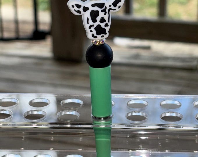 Black Cow Head on Mint Pen