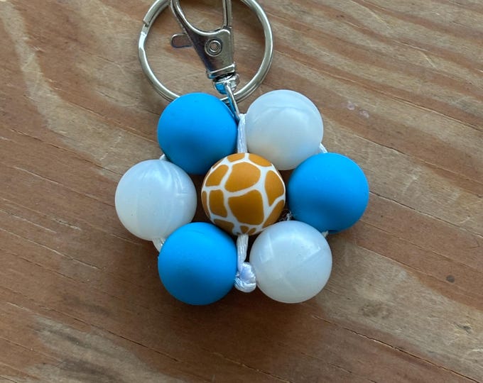 Giraffe flower charm