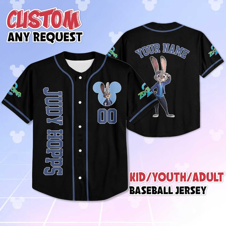May include: Black baseball jersey with blue accents, featuring "JUDY HOPPS" on the front and a cartoon rabbit graphic. The jersey includes the text "CUSTOM ANY REQUEST" and "KID/YOUTH/ADULT BASEBALL JERSEY".