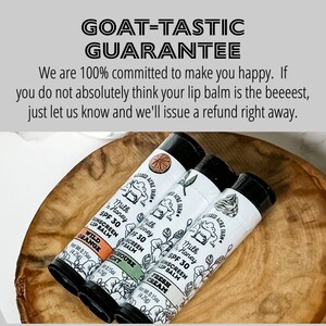 May include: Three lip balm tubes with white labels and black caps. The labels feature a goat illustration and the text "Blessed Acre Farm" and "Milk & Honey SPF 30 Sunscreen Lip Balm". The flavors are Wild Orange, Greenhouse Mint, and Fresh Cream.