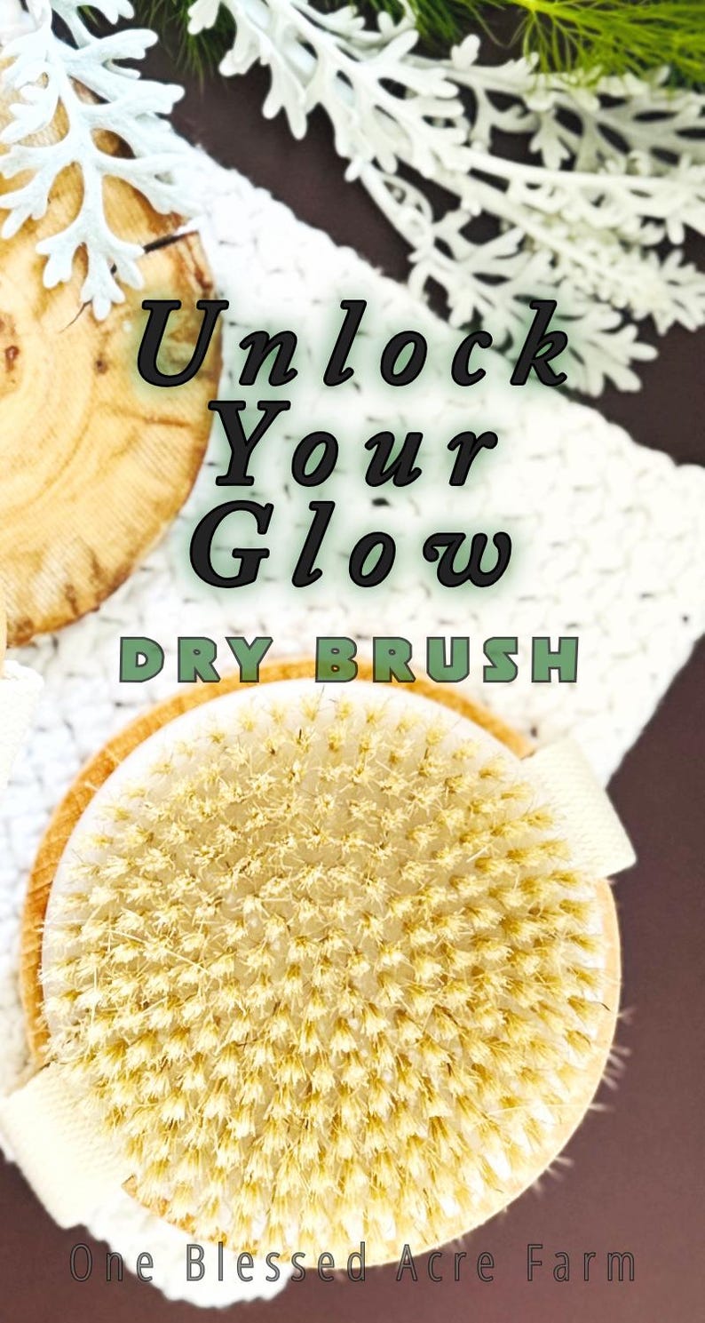 May include: A round dry brush with light-colored natural bristles and a wooden base featuring a beige fabric strap. The text Unlock Your Glow DRY BRUSH and One Blessed Acre Farm is printed over the image of the brush and wooden accents.