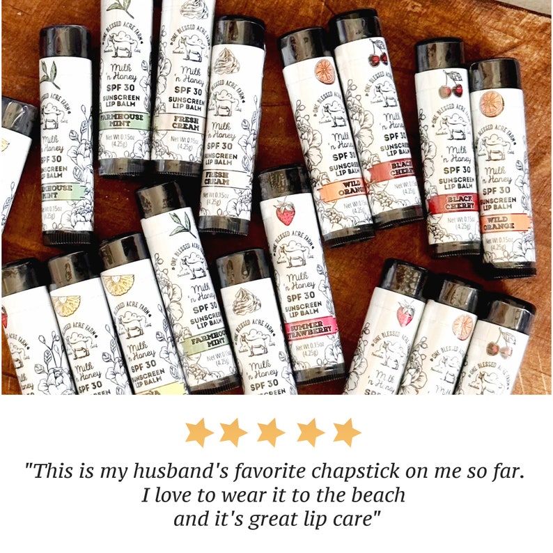 May include: A collection of 15 different flavored lip balms with SPF 30 sunscreen. The lip balms are in black tubes with white labels and feature a variety of flavors, including Farmhouse Mint, Fresh Cream, Wild Orange, Black Cherry, Summer Strawberry, and more.
