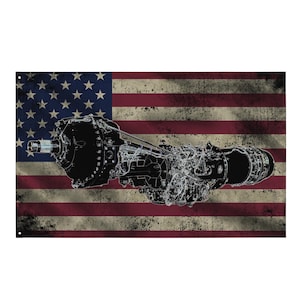 May include: A black and white illustration of a jet engine is superimposed over a distressed American flag. The flag features red and white stripes and a blue field with white stars. The engine is detailed with various mechanical components.