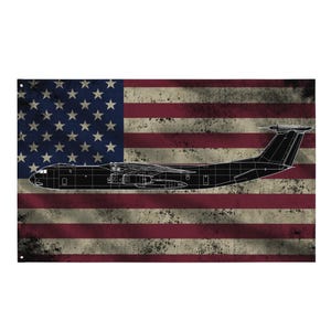 May include: A distressed American flag design with a black outline of a cargo plane. The flag features red and white stripes with a blue field of white stars. The plane's silhouette is detailed, showing the wings, tail, and fuselage.