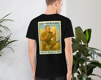 May include: Black t-shirt with a graphic on the back depicting a man in military attire holding a wrench and a baby bottle. The graphic includes the text "DAD and MAINTAINER" and "EQUALLY SKILLED AT BOTH".