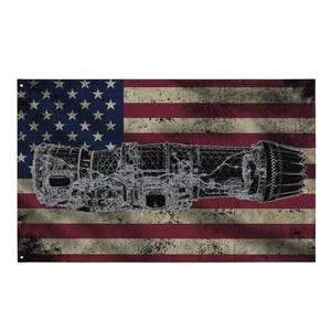 May include: A distressed American flag design with a detailed, technical illustration of a jet engine overlaid on the red and white stripes. The flag features the stars and stripes in a vintage, worn style.