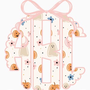May include: A circular monogram featuring the letters ABC in a scalloped frame, topped with a light pink bow. The design includes a pattern of orange pumpkins, beige ghosts, and small blue and pink flowers on a white background with black dots.