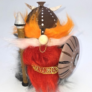 Handmade Viking gnome with helmet, spear, shield and jewelry.