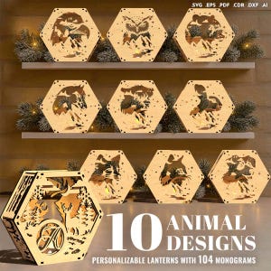May include: Wooden, hexagonal lanterns with animal designs, including an eagle, owl, and wolf. The lanterns are displayed on a shelf with decorative greenery. The image includes the text "10 ANIMAL DESIGNS" and "PERSONALIZABLE LANTERNS WITH 104 MONOGRAMS."